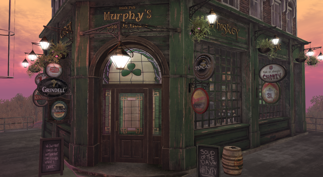 An Irish pub exterior with dark wood panels, green painted trim, clover window pane motifs, and gold lettered sign over the door.